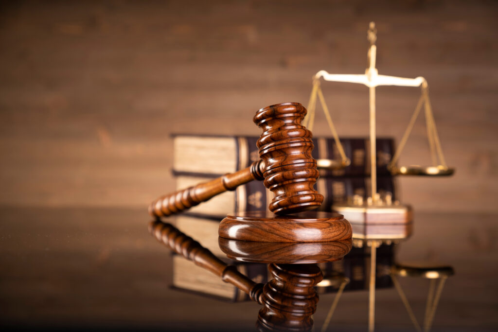 gavel on desk with balance scale